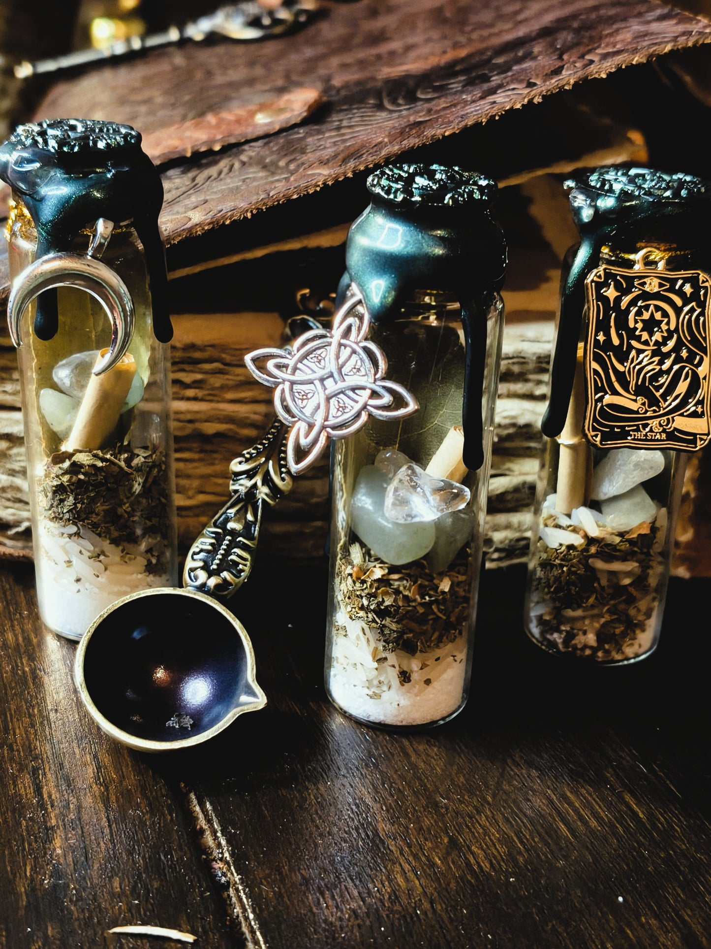 Handcrafted good luck spell jars sealed with green wax, filled with basil, bay leaves, aventurine and clear quartz crystals, handmade by Malika's Realm in Aveyron France